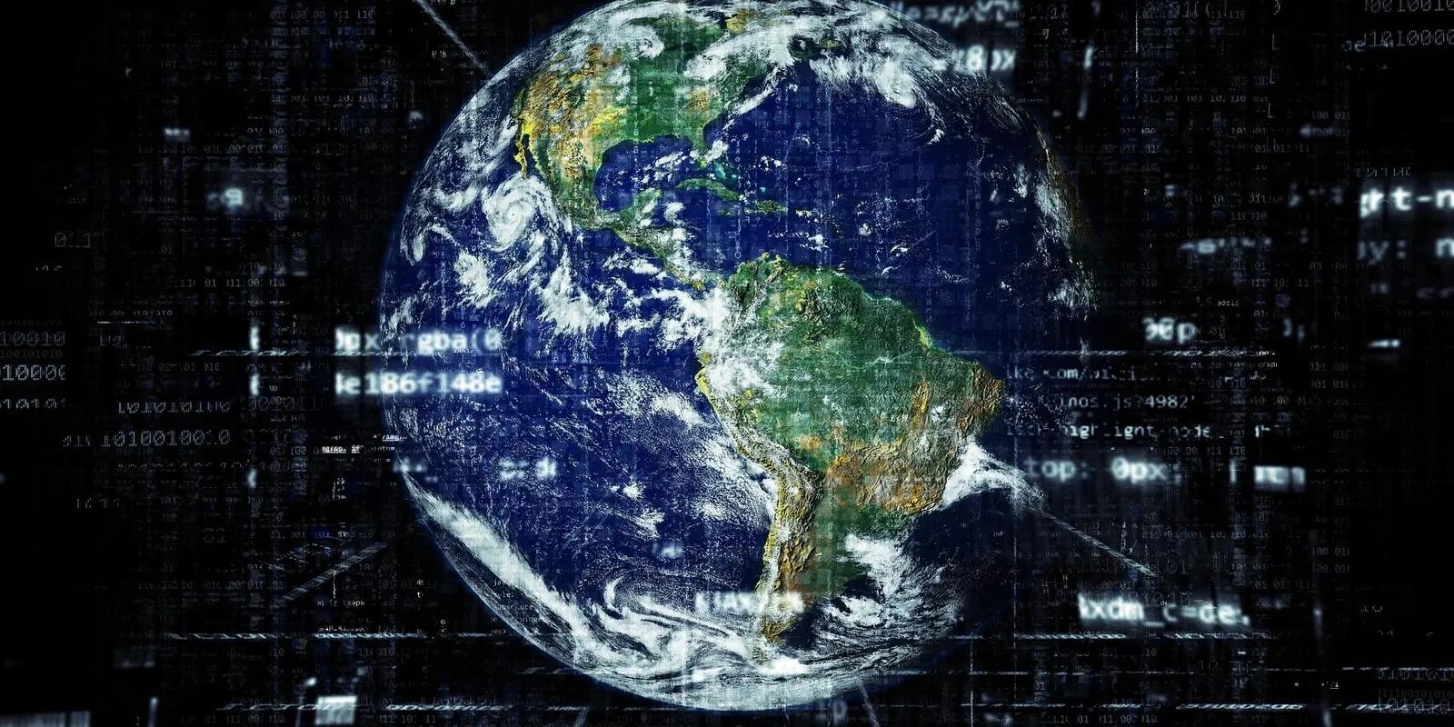 Earth view from space showing Americas continent against digital code background representing global technology.
