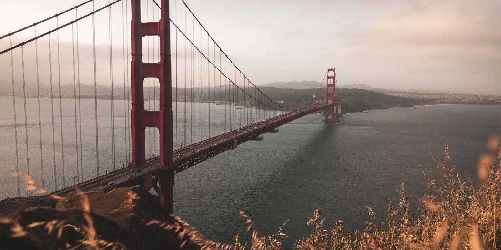 Golden Gate Bridge in San Francisco, California, on a misty day.