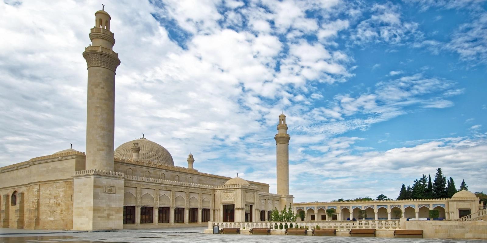 Juma Mosque in Shamakhi, Azerbaijan, showcasing its grand Islamic architecture with domes and minarets.